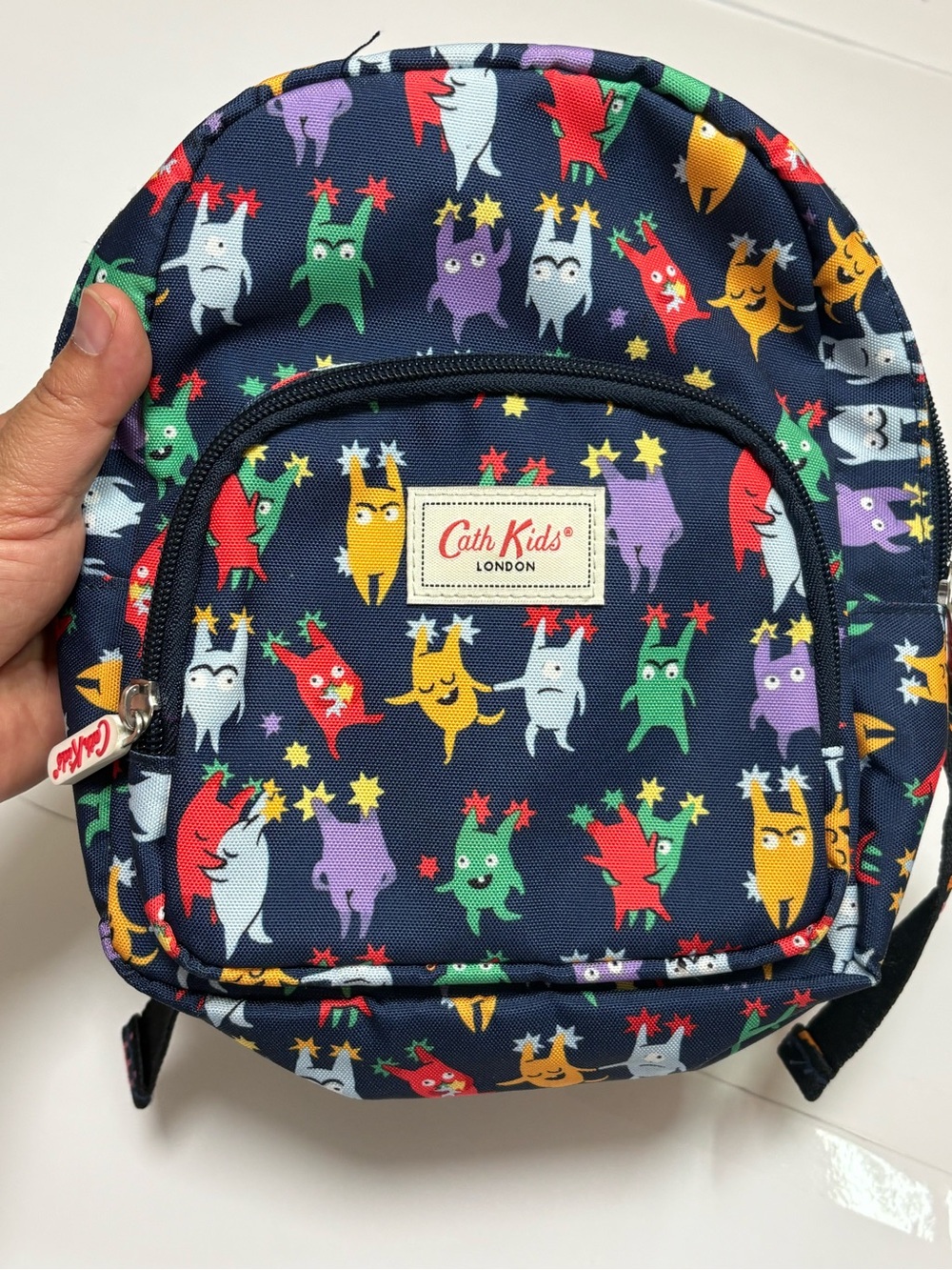 Cath Kids London Mini Toddler Backpack Navy Monster Print Orange Lining